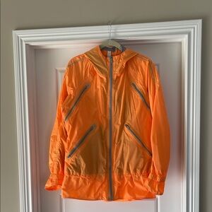 lululemon athletica Women’s Vibrant Orange Windbreaker. No smoking/ no pets.